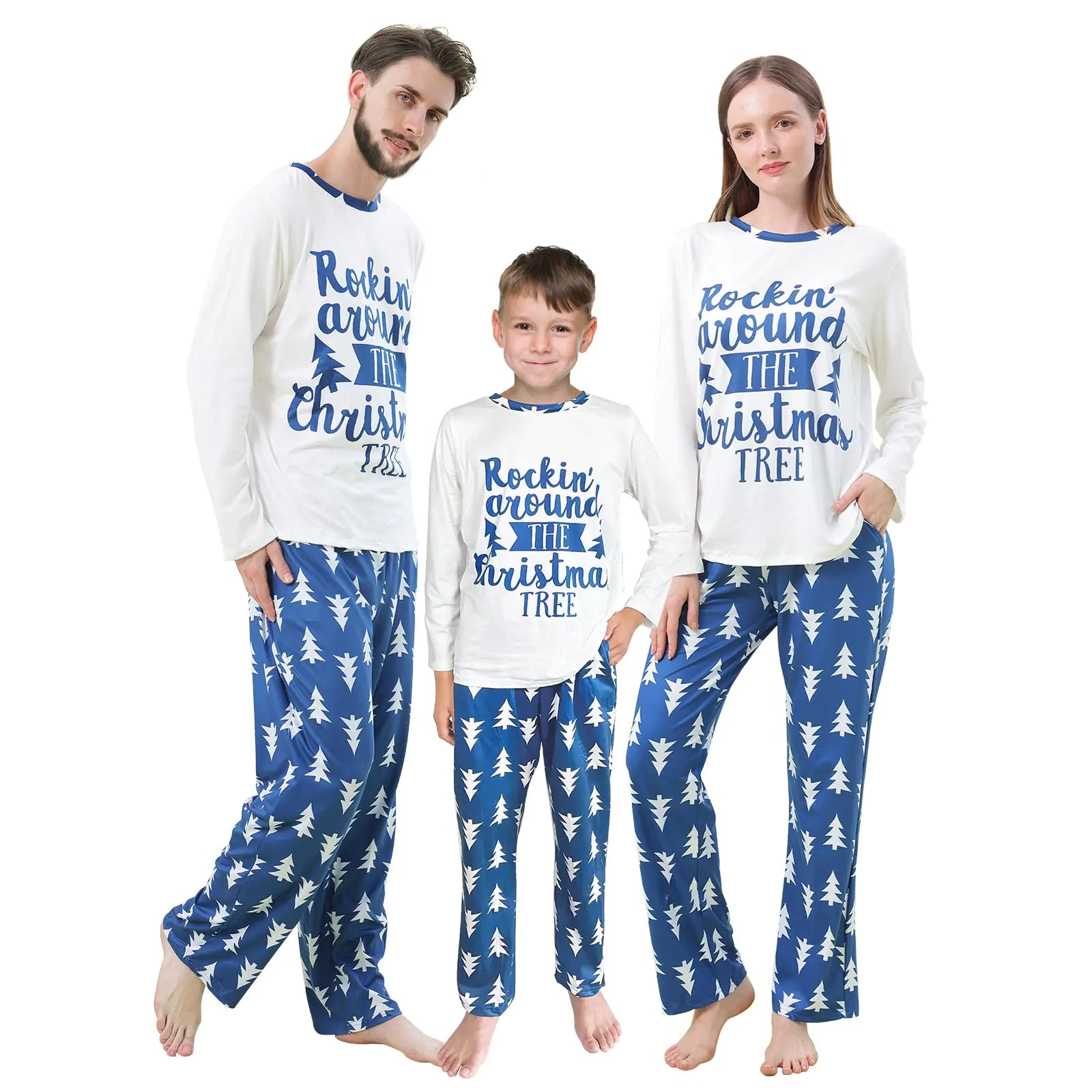 Family wearing matching Christmas pajamas with blue and white designs.